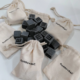 bags with baby stone pieces from marmomac